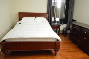 Modern One Bedroom Unit, Sofa Bed, Adjustable Queen Bed, 75 Inch Smart TV and Indoor Secure Parking